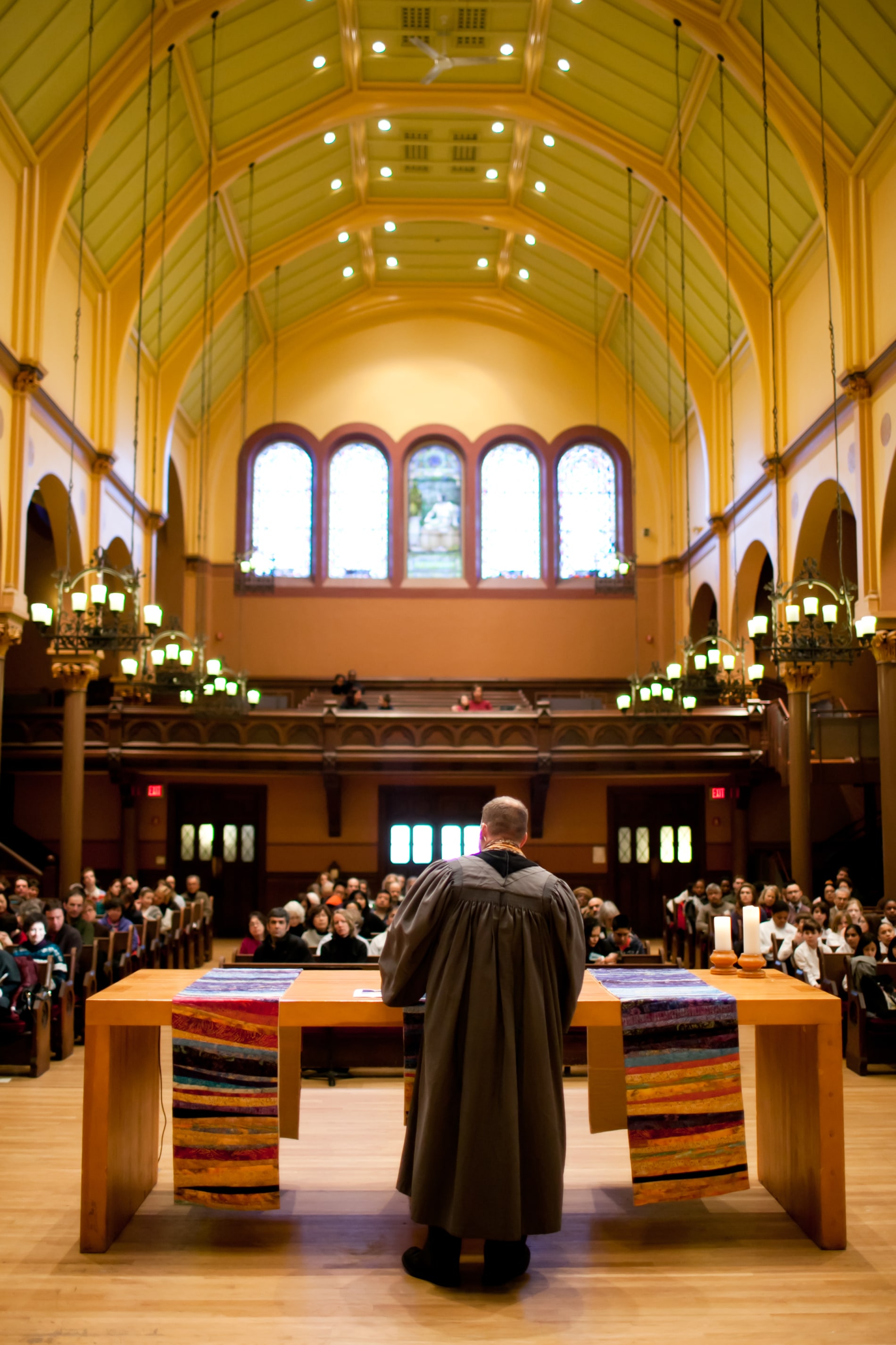 A wide angle view showing the congregation in worship in the First Church sanctuary