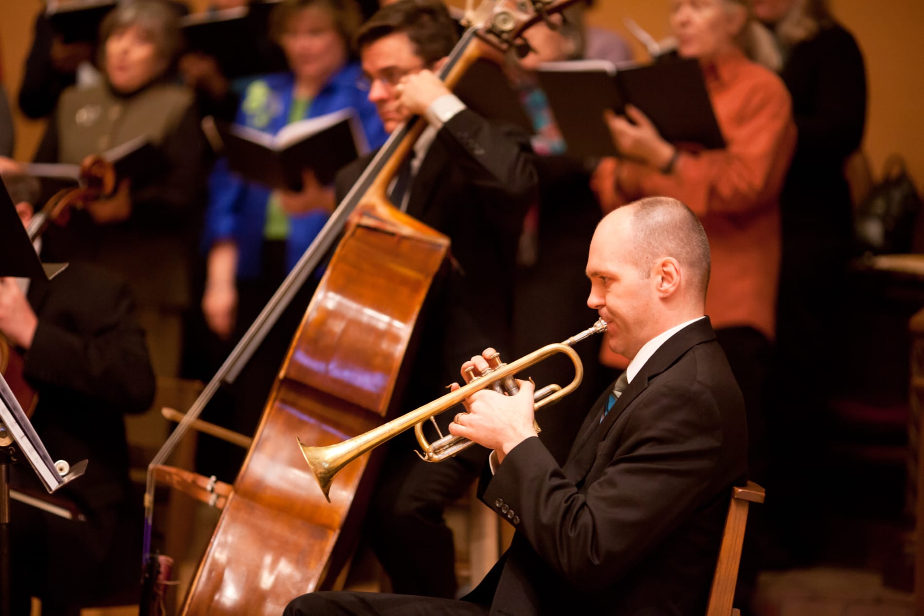 A small orchestra plays in the sanctuary of First Church Cambrige