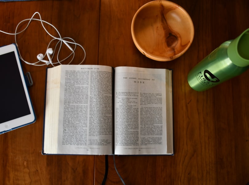 picture of a bible and ipad on a table